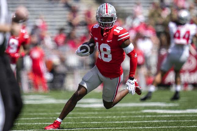 Apr 15, 2023; Columbus, Ohio, United States;  Ohio State Buckeyes wide receiver Marvin Harrison Jr. (18) sprints down the side of the field during the first quarter of the Ohio State Buckeyes spring game at Ohio Stadium on Saturday morning.