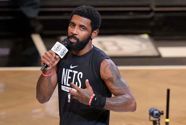 Brooklyn Nets’ Kyrie Irving speaks before the team’s NBA basketball game against the New Orleans Pelicans on Oct. 19, 2022, in New York. The Nets are suspending Irving for at least five games without pay, saying they were dismayed by his failure to “unequivocally say he has no antisemitic beliefs.” Hours after Irving refused to issue the apology that NBA Commissioner Adam Silver sought for posting a link to an antisemitic work on his Twitter feed, the Nets said that Irving is “currently unfit to be associated with the Brooklyn Nets.”