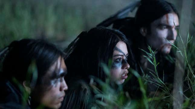 (from left): Harlan Blayne Kytwayhat as Itsee, Amber Midthunder as Naru, and Dakota Beavers as Taabe in Dan Trachtenberg’s Prey.