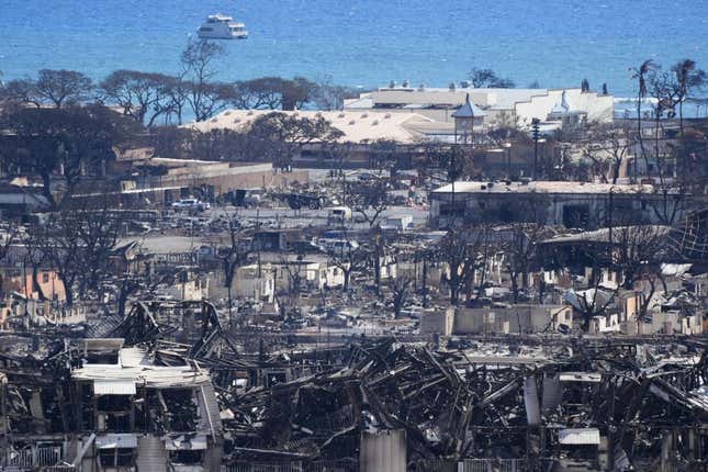 Aug. 12, 2023 : Burned houses and buildings are seen in Lahaina. Thousands were displaced after a wildfire fueled by winds from Hurricane Dora and dry vegetation destroyed much of the town. The death toll from the fire makes it the deadliest wildfire of the past U.S.