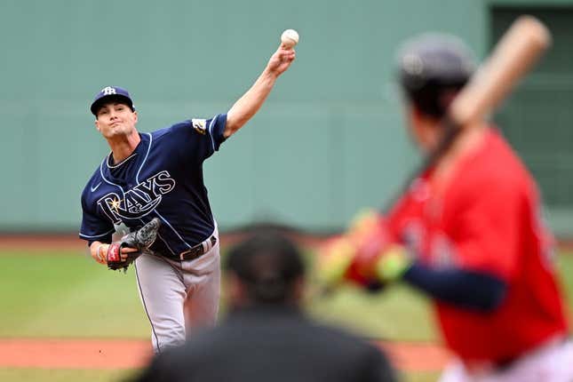 Jun 5, 2023; Boston, Massachusetts, USA; Tampa Bay Rays starting pitcher Shane McClanahan (18) pitches against the Boston Red Sox during the first inning at Fenway Park.