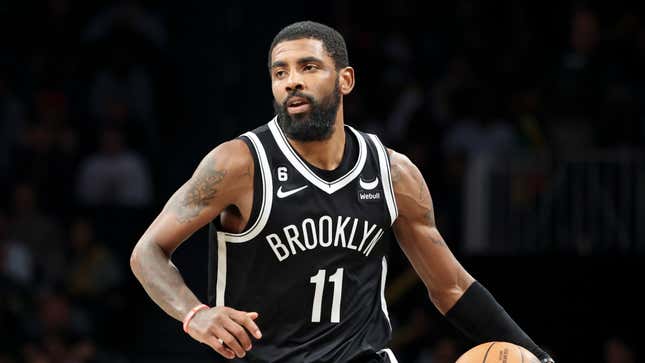 Brooklyn Nets guard Kyrie Irving (11) dribbles against the Chicago Bulls during the second half of an NBA basketball game Tuesday, Nov. 1, 2022, in New York.