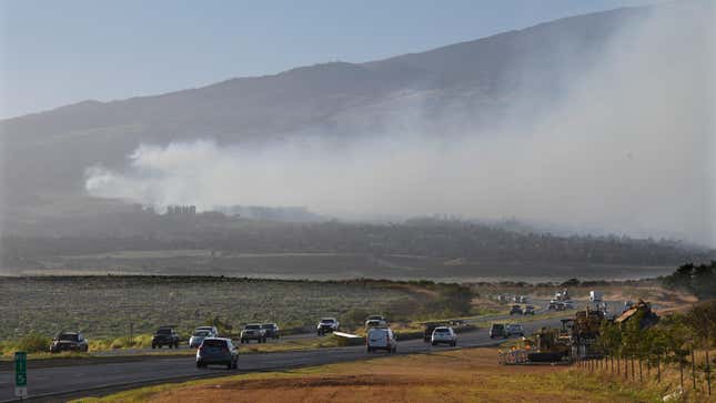 Smoke blows across the slope of Haleakala volcano on Maui, Hawaii, as a fire burns in Maui’s upcountry region on August. 8. 2023.