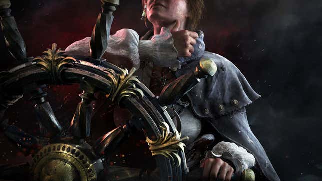A woman stands behind a large pirate steering wheel while pointing her thumb at her throat.