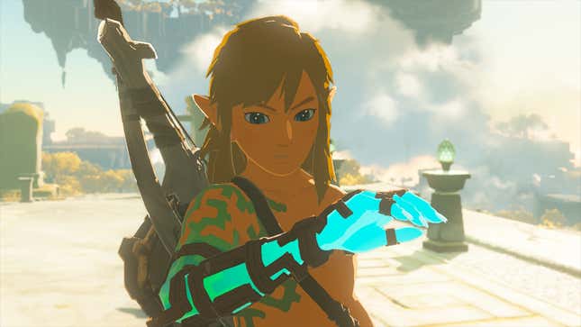 Link is seen looking at his corrupted arm.