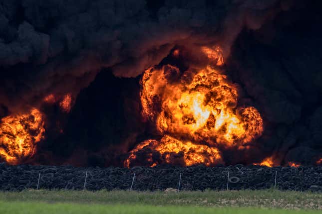 Flames rage at the tire dump in the town of Sesena in Toledo province, located in southern Spain.