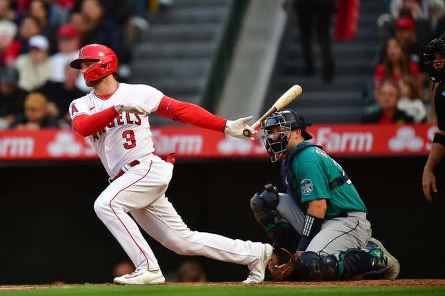 Jun 9, 2023; Anaheim, California, USA; Los Angeles Angels left fielder Taylor Ward (3) reaches first on a fielding error by Seattle Mariners shortstop J.P. Crawford (3) during the third inning at Angel Stadium.