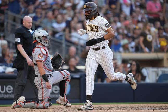 Aug 16, 2023; San Diego, California, USA;  San Diego Padres right fielder Fernando Tatis Jr. (23) scores on an RBI single by first baseman Jake Cronenworth (not pictured) during the third inning against the Baltimore Orioles at Petco Park.