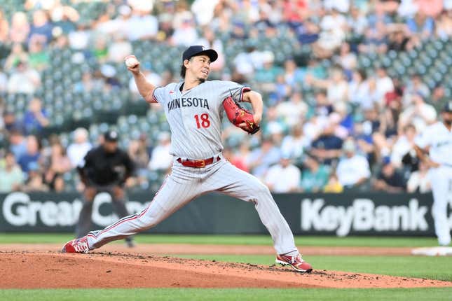 Jul 19, 2023; Seattle, Washington, USA; Minnesota Twins starting pitcher Kenta Maeda (18) pitches to the Seattle Mariners during the swconds inning at T-Mobile Park.