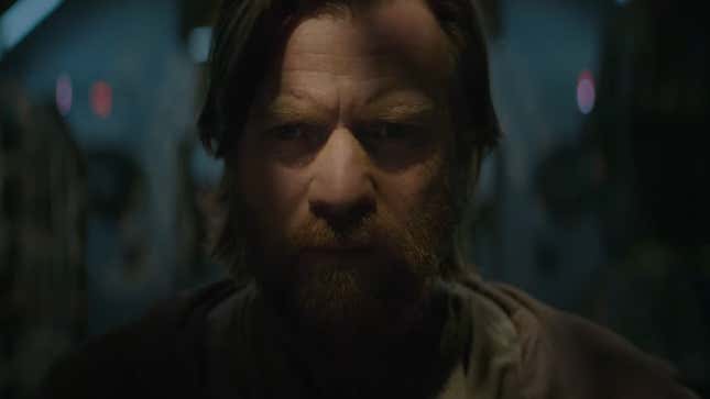 Ewan McGregor's Obi-Wan Kenobi, cloaked in shadow, as he looks at something concerned.