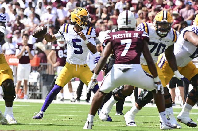 Sep 16, 2023; Starkville, Mississippi, USA; LSU Tigers quarterback Jayden Daniels (5) makes a pass against the Mississippi State Bulldogs during the first quarter at Davis Wade Stadium at Scott Field.