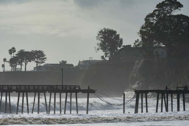 The Capitola Wharf is seen damaged from storm waves in Capitola, California, Thursday, Jan. 5, 2023.