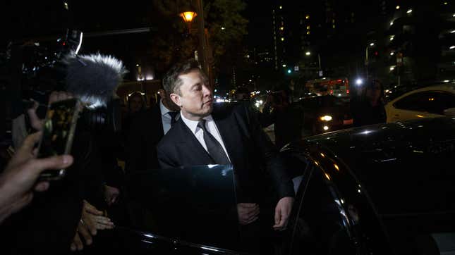 Elon Musk, chief executive officer of Tesla Inc., departs from federal court in Los Angeles, California, U.S., on Tuesday, Dec. 3, 2019. Musk will have to go before a federal jury and defend calling a British caver a “pedo guy.” 
