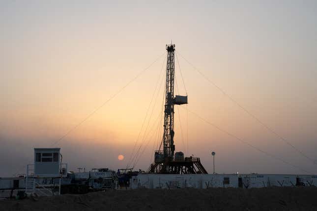 A general view shows an oil rig used in drilling at the Zubair oilfield in Basra, Iraq, July 5, 2022