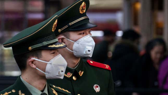 Chinese police wear masks in Beijing on Jan. 22, 2020.