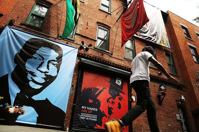 A memorial of Eric Garner, left, next to one of Michael Brown as seen outside of filmmaker’s Spike Lee’s 40 Acres offices on August 15, 2014, in Brooklyn, N.Y.