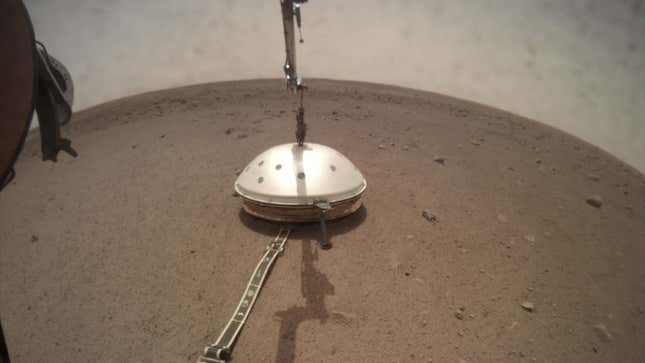 The Wind and Thermal Shield sitting atop InSight’s seismometer.