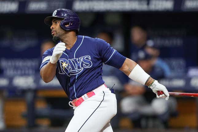 Sep 9, 2023; St. Petersburg, Florida, USA;  Tampa Bay Rays first baseman Yandy Diaz (2) hits an rbi double against the Seattle Mariners in the seventh inning at Tropicana Field.