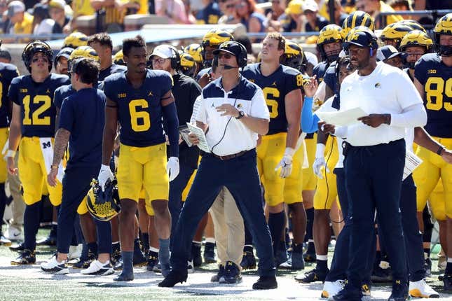 Michigan Wolverines head coach Jim Harbaugh and offensive coordinator Sherrone Moore, pictured during 

Michigan&#39;s 2022 season opener.