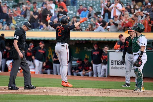 Aug 18, 2023; Oakland, California, USA; Baltimore Orioles infielder Gunnar Henderson (2) jumps onto home plate after hitting a two run home run against the Oakland Athletics during the second inning at Oakland-Alameda County Coliseum.