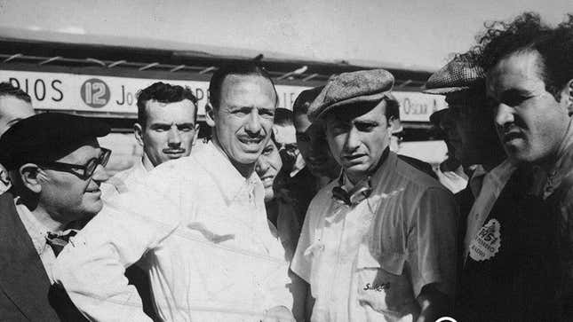 A photo of Oscar Alfredo Gálvez with Juan Manuel Fangio.