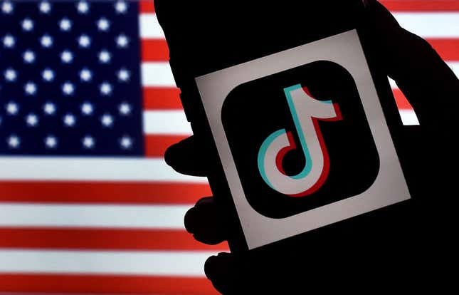The TikTok logo in front of an American flag.