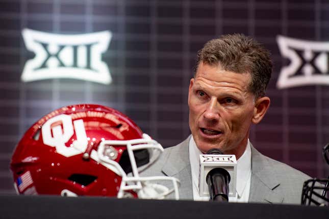 Oklahoma coach Brent Venables answers questions from reporters during the Big 12 college football media days in Arlington, Texas.