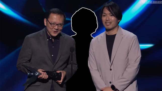 A shadowy figure stalks the FromSoftware team on stage at the Game Awards.