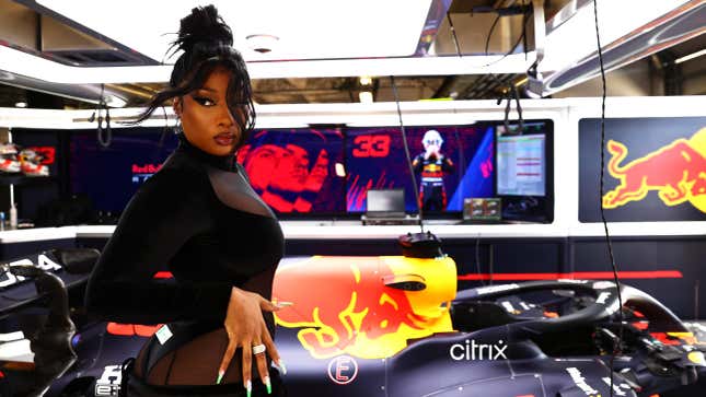  Megan Thee Stallion poses for a photo in the Red Bull Racing garage before the F1 Grand Prix of USA on October 24, 2021 in Austin, Texas.