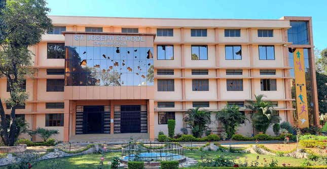 The facade of a school vandalised in Vidisha, India.