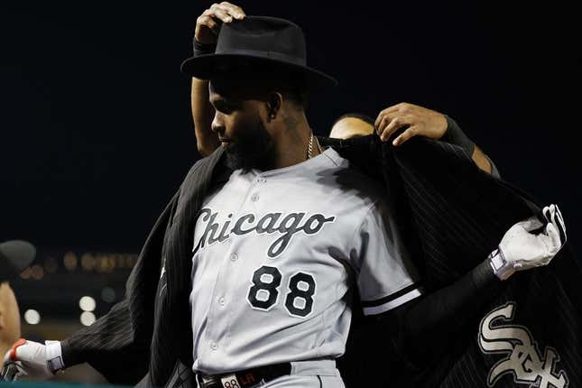 Sep 19, 2023; Washington, District of Columbia, USA; Chicago White Sox center fielder Luis Robert Jr. (88) is given the \&quot;Southside Jacket\&quot; by White Sox shortstop Elvis Andrus (1) after hitting a home run against the Washington Nationals during the fourth inning at Nationals Park.