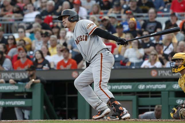 Jul 14, 2023; Pittsburgh, Pennsylvania, USA; San Francisco Giants first baseman Wilmer Flores (41) hits a single against the Pittsburgh Pirates during the third inning at PNC Park.