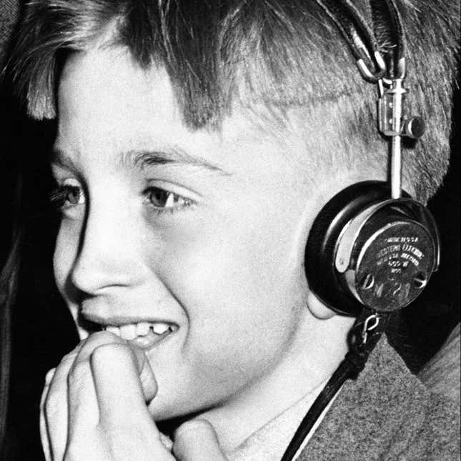 A boy wearing headphones.