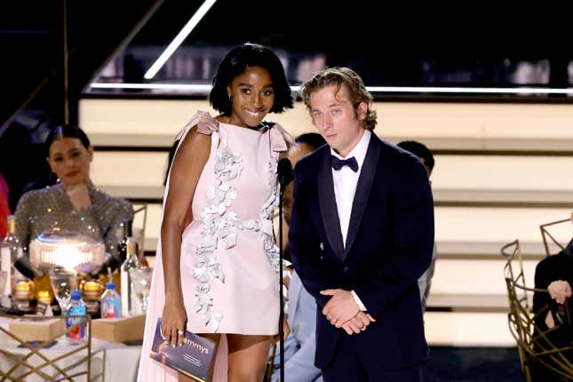 LOS ANGELES, CALIFORNIA - SEPTEMBER 12: (L-R) Ayo Edebiri and Jeremy Allen White speak onstage during the 74th Primetime Emmys at Microsoft Theater on September 12, 2022 in Los Angeles, California. (Photo by Kevin Winter/Getty Images)
