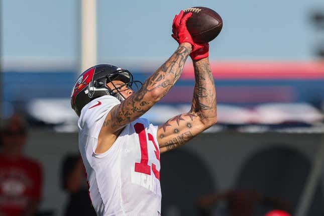 Aug 3, 2023; Tampa Bay, FL, USA;  Tampa Bay Buccaneers wide receiver Mike Evans (13) participates in training camp at AdventHealth Training Center.