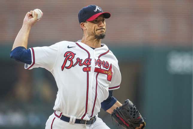 Aug 23, 2023; Cumberland, Georgia, USA; Atlanta Braves starting pitcher Charlie Morton (50) pitches against the New York Mets during the first inning at Truist Park.