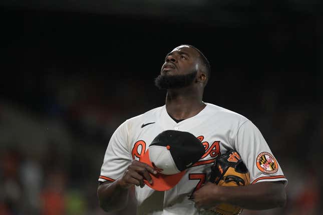 Aug 22, 2023; Baltimore, Maryland, USA; Baltimore Orioles relief pitcher Felix Bautista (74) walks off the field after pitching the ninth inning against the Toronto Blue Jays  at Oriole Park at Camden Yards.
