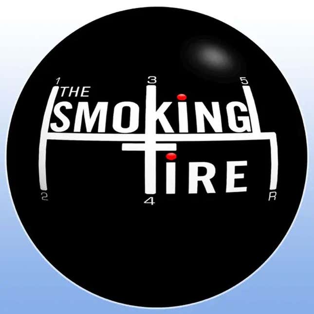 The logo for The Smoking Tire podcast featuring a gear shift lever. 