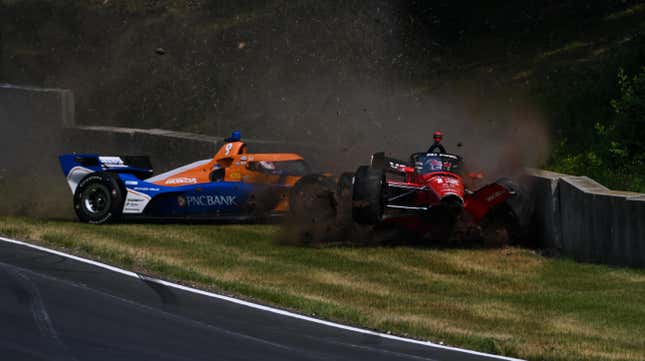 The cars of Will Power and Scott Dixon colliding with concrete barriers at Road America.
