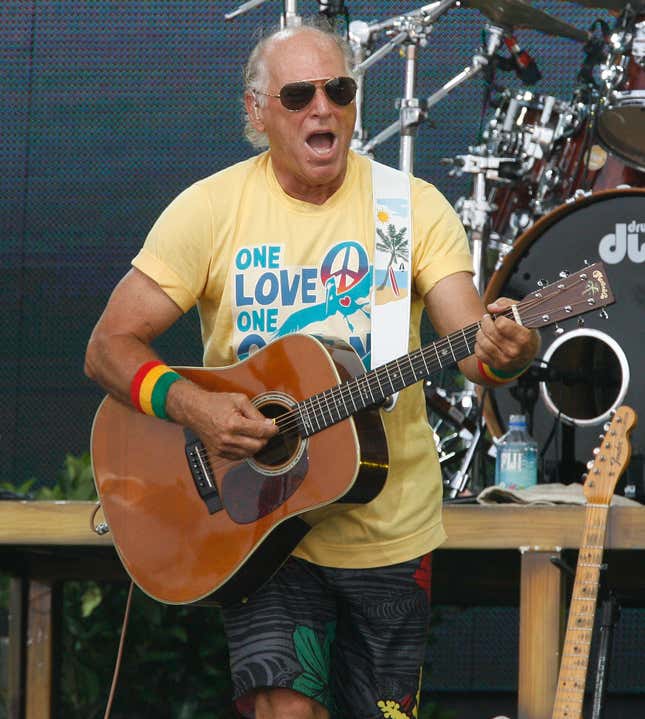 FILE - Jimmy Buffett performs Sunday, July 11, 2010 in Gulf Shores, Ala. Buffett, who popularized beach bum soft rock with the escapist Caribbean-flavored song “Margaritaville” and turned that celebration of loafing into an empire of restaurants, resorts and frozen concoctions, has died, Friday, Sept. 1, 2023. (Chip English/Press-Register via AP, File)
