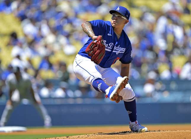Aug 13, 2023; Los Angeles, California, USA; Los Angeles Dodgers starting pitcher Julio Urias (7) throws to the plate in the first inning against the Colorado Rockies at Dodger Stadium.