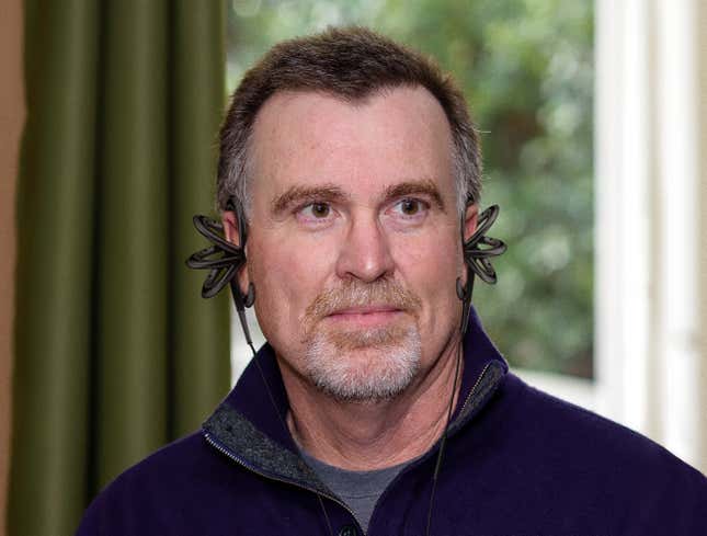 Image for article titled Dad Wearing Some New Kind Of Headphones That Wrap Over, Under, Around Ears