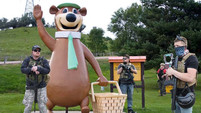 Image for article titled Heavily Armed Fans Guard Statue Of Yogi Bear In Case It Turns Out He Supported Confederacy
