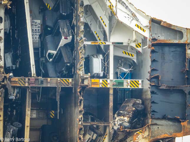 Image for article titled A Chain Just Cut Through A Capsized Cargo Ship Filled With Cars And The Process Is Fascinating (UPDATE W/VIDEO)