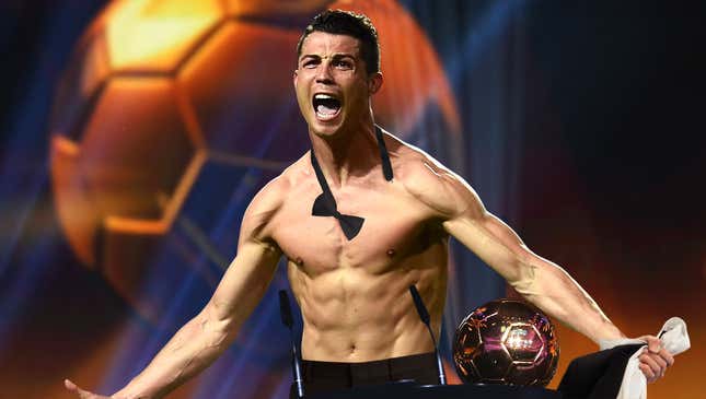 Image for article titled Cristiano Ronaldo Celebrates Ballon D’Or Win By Ripping Off Tuxedo