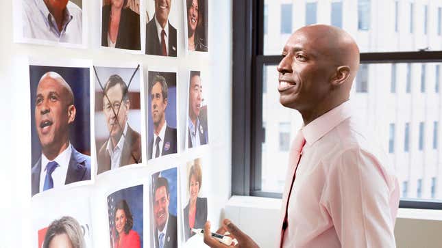 Image for article titled ‘And Then There Were 23,’ Says Wayne Messam Crossing Out Hickenlooper Photo In Elaborate Grid Of Rivals