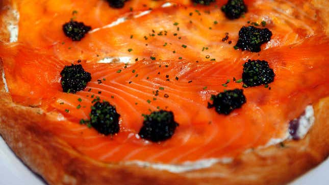 Pizza with smoked salmon and caviar
