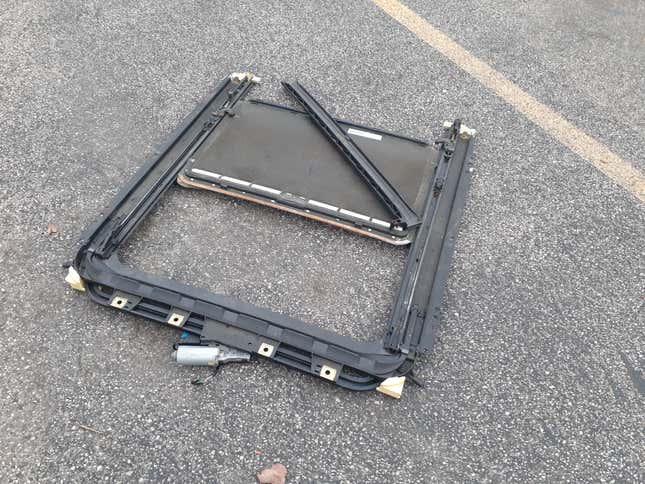 Image for article titled How I Fixed A Broken Sunroof In One Of The Most Unreliable Cars Of The Modern Era