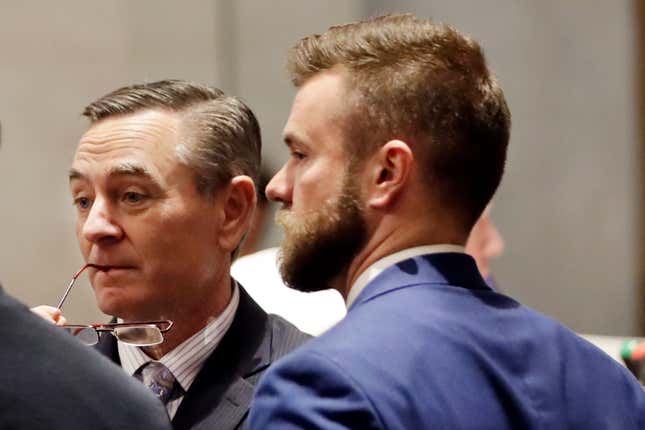  House Speaker Glen Casada, R-Franklin, left, talks with Cade Cothren, right, his chief of staff, during a House session in Nashville, Tenn. Cothren has resigned amid allegations of racist and sexually explicit texts. 