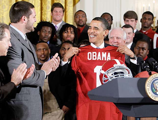 Image for article titled &#39;What The Fuck Am I Going To Do With This?&#39; Obama Says While Holding Alabama Jersey